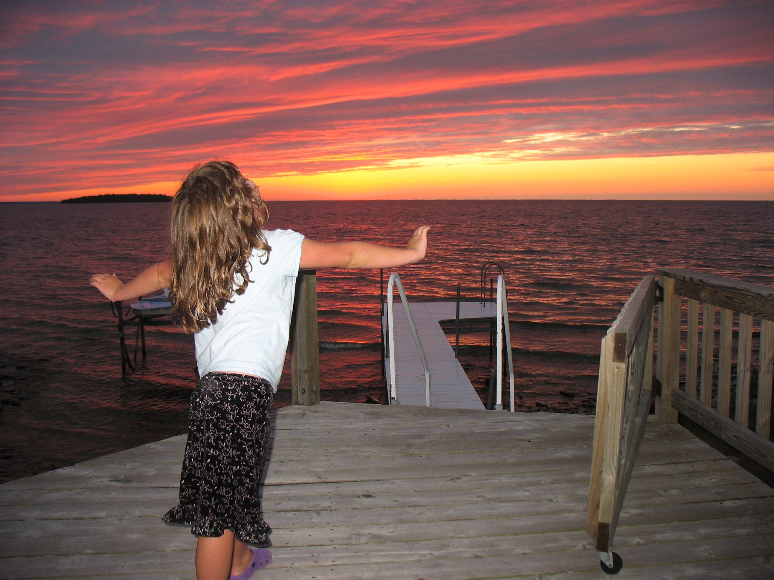 Analise Rejoicing in Front of the Sunset